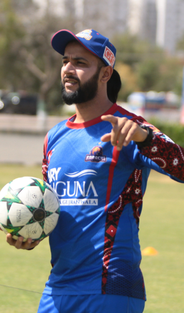 Captain Imad Wasim distributing players for football running practice